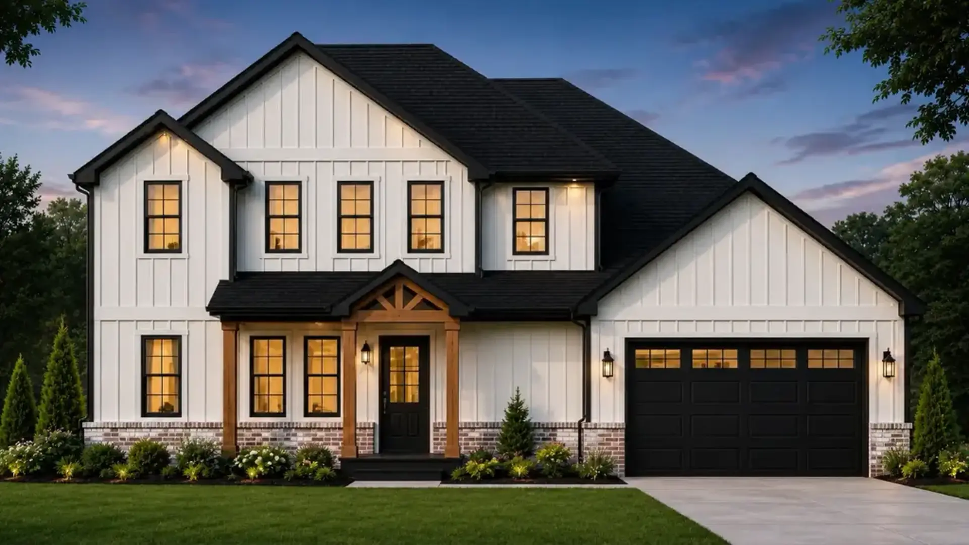 Modern two-story house with white siding, black roof, Theo black-framed windows, and a black garage door. The front porch has wooden posts, exterior lights are on, and a green lawn with shrubs is in front.