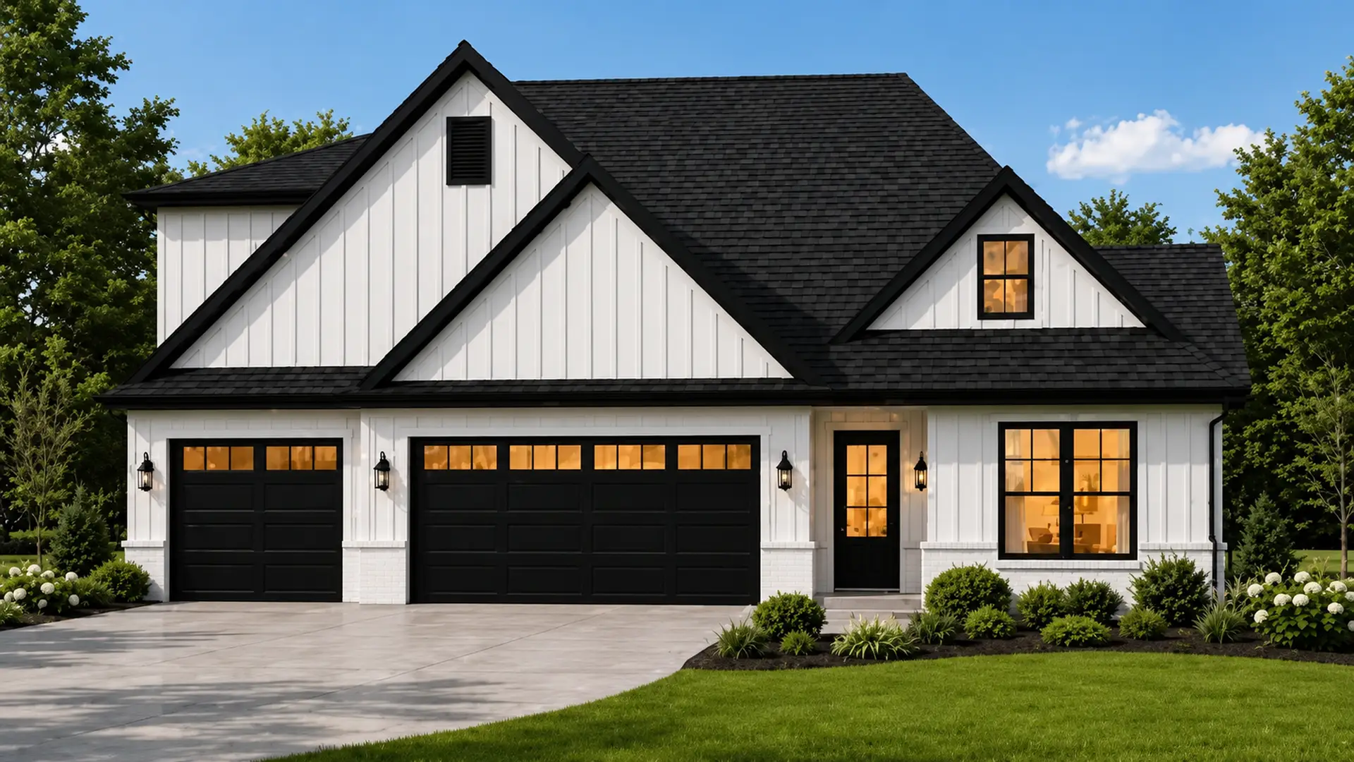 Modern Theo house with white vertical siding, black trim, and a three-car garage. Large windows are lit from inside. The yard is landscaped with green grass, shrubs, and trees. Blue sky in the background.